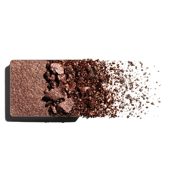 Makeup eyeshadow refill with mulberry mink pearl powder on a white background