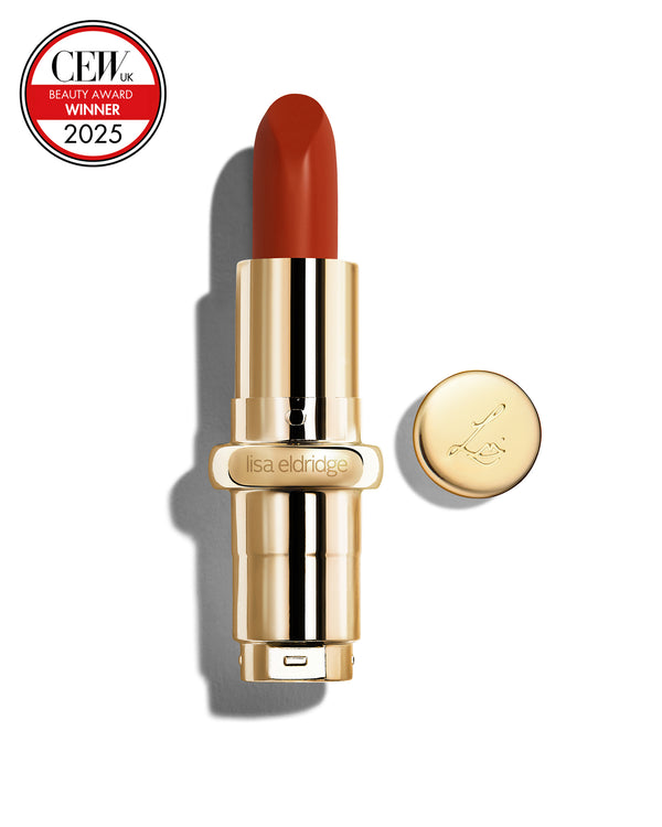 Chilli-red coloured lipstick with gold casing and 'Lisa Eldridge' branding on a white background, featuring a CEW Beauty Award 2025 badge.