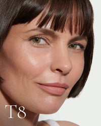 block The white pod packaging of Seamless Skin Enhancing Tint by Lisa Eldridge